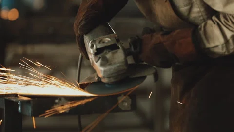 CUTTING METAL WITH ANGLE GRINDER Stock Footage 306691955