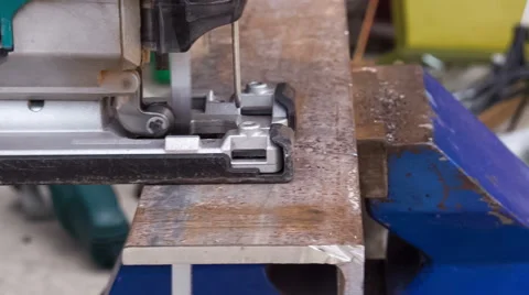 Cutting metal blank using jigsaw Stock Footage 50688448
