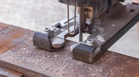 Cutting metal blank using jigsaw Stock Footage 50690871