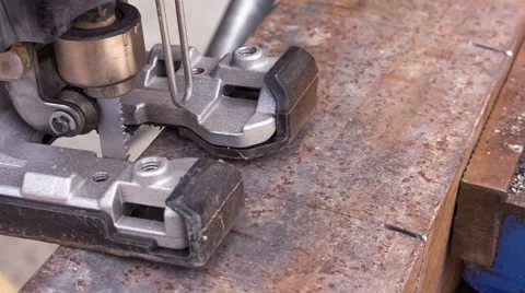 Cutting metal blank using jigsaw Stock Footage 50699678