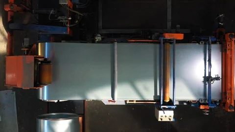 Cutting metal bobbin on the machine Stock Footage 129693708