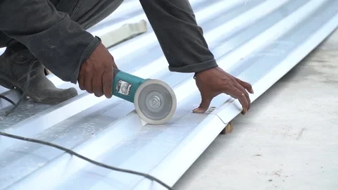 Cutting metal with cutting machine - worker Stock Footage 134790650