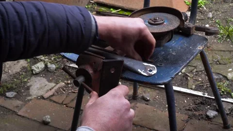 Cutting metal with a grinder Stock Footage 306782510