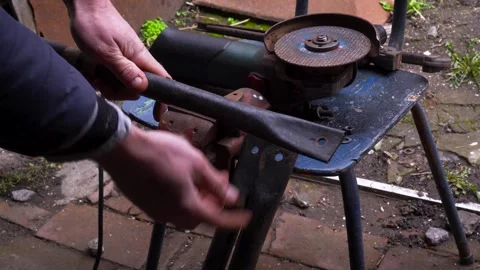 Cutting metal with a grinder Stock Footage 306782610