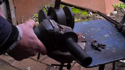 Cutting metal with a grinder Stock Footage 306782683