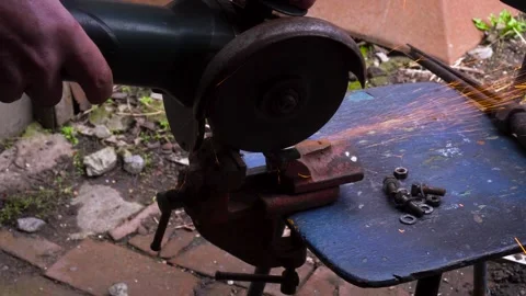 Cutting metal with a grinder Stock Footage 306782685