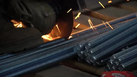 Cutting a metal pipe with a splash of spark. Stock Footage 159643682