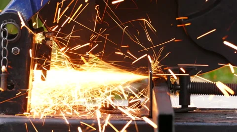 Cutting of a metal pipe with splashes of sparks Stock Footage 68857538