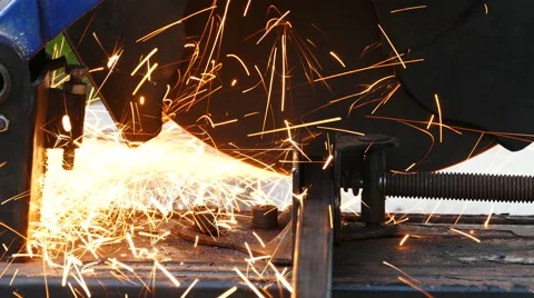 Cutting of a metal pipe with splashes of sparks Stock Footage 68880668