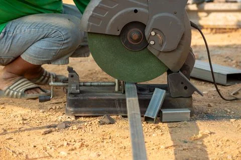 Cutting metal with precision tools a construction site detailed work outdoo.. Stock Photos