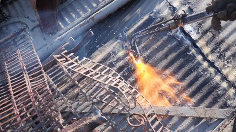 Cutting metal sheet at the scrap yard with oxygen cutter Video stock 126020886