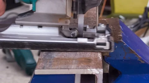 Cutting metal workpiece using jigsaw Stock Footage 50698743