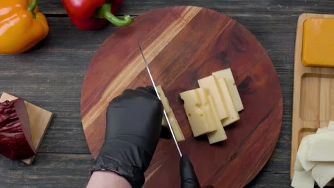 Cutting mozzarella cheese slices Stock Footage 335449614