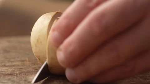 Cutting the mushroom in half. Stock Footage 263363968