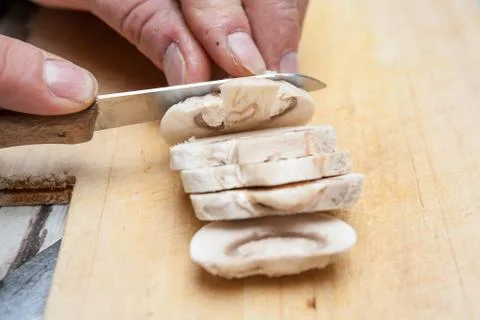 Cutting a mushroom Stock Photos