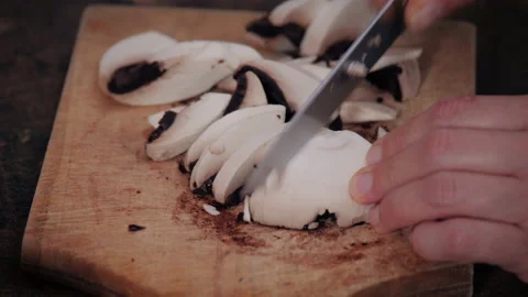 CUTTING MUSHROOMS CLOSE UP Stock Footage 154000011