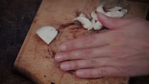 CUTTING MUSHROOMS CLOSE UP Stock Footage 154000877
