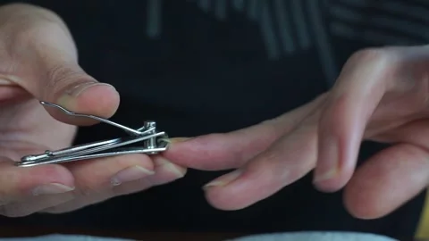 Cutting nails Stock Footage 257502896