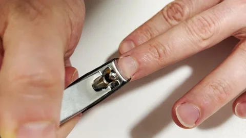 Cutting Nails with Nail Clipper. Self-care nails 스톡 동영상 169532993
