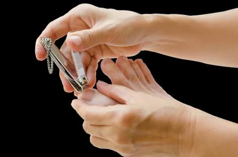 Cutting nails. Stock Photos