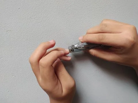 Cutting nails Stock Photos