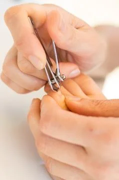 Cutting nails Stock Photos