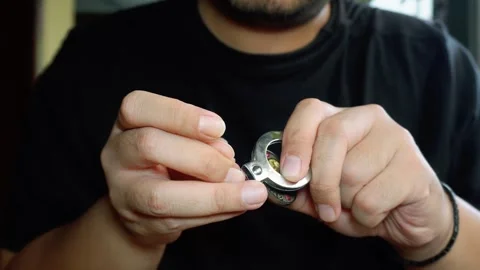 Cutting nails using stainless steel nail clipper Stock Footage 288826746