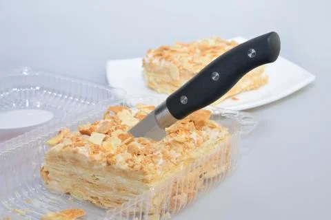 Cutting Napoleon cake Stock Photos