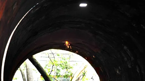 Cutting an old metal pipe into scrap metal Stock Footage 246438542
