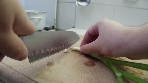 Cutting onion on a chopping board Stock Footage 286841640