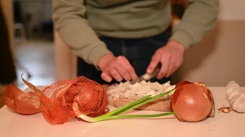 Cutting onion in the kitchen Stock Footage 263231712