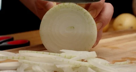 Cutting onion macro shot 스톡 동영상 126257617