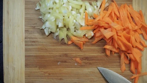 Cutting onion overhead Stock Footage 98360707