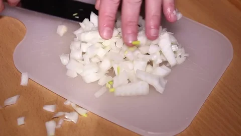 Cutting onion for salad close up Stock Footage 71296225