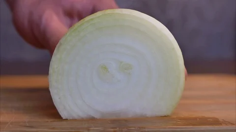Cutting Onion into Slices Stop Motion Animation Video stock 115987846