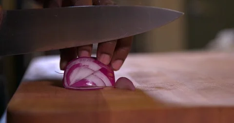 Cutting an onion in slow motion 1 Stock Footage 87846685