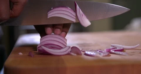 Cutting an onion in slow motion 3 Stock Footage 87846753