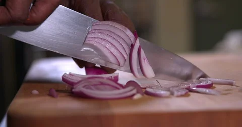 Cutting an onion in slow motion 4 Stock Footage 87846682