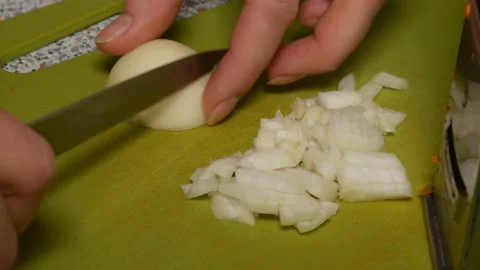 Cutting onions for frying Stock-Footage 86602082