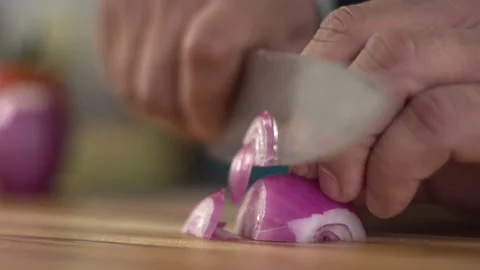 Cutting onions for home kitchen Stock Footage 160622354