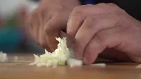 Cutting onions to make salad Stock Footage 160622336