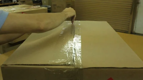 Cutting Open a Box 動画素材 33073377