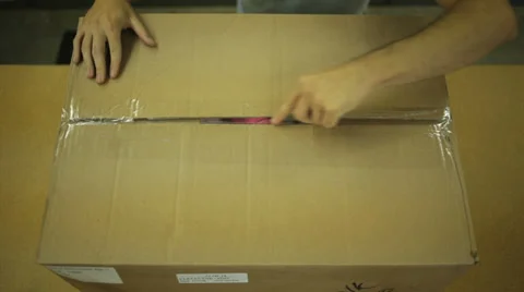 Cutting Open a Box 動画素材 33073860