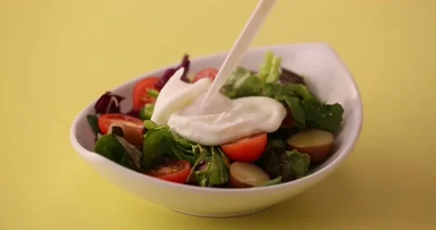 Cutting open egg with a knife 2 Stock Footage 132146823