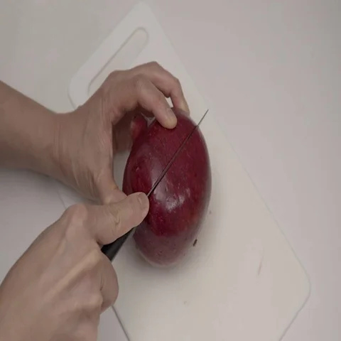 Cutting open a Pomegranate Fruit.  4K UHD. Stock Footage 69706255