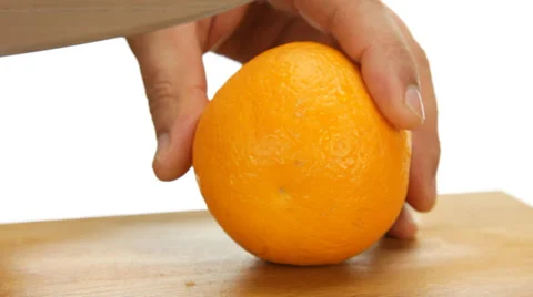 Cutting orange on chopping board Stock Footage 33662020
