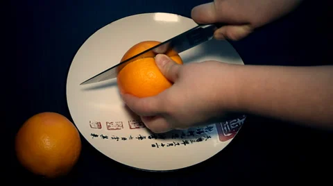 The cutting of the orange Stock Footage 35162805