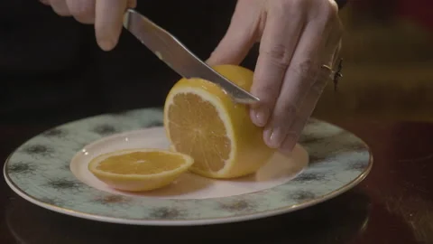 Cutting an orange Stock Footage 176468586