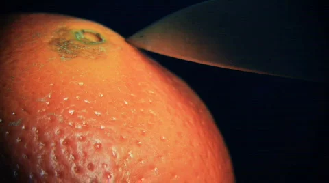 Cutting an Orange fruit HD Stock Footage 504327