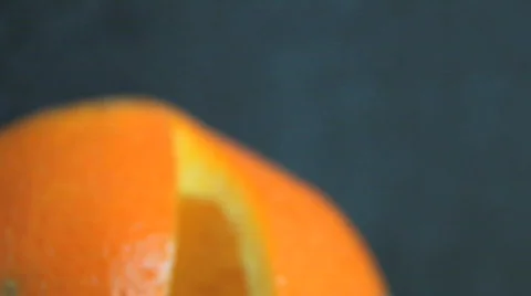 Cutting an Orange fruit HD Stock Footage 504843